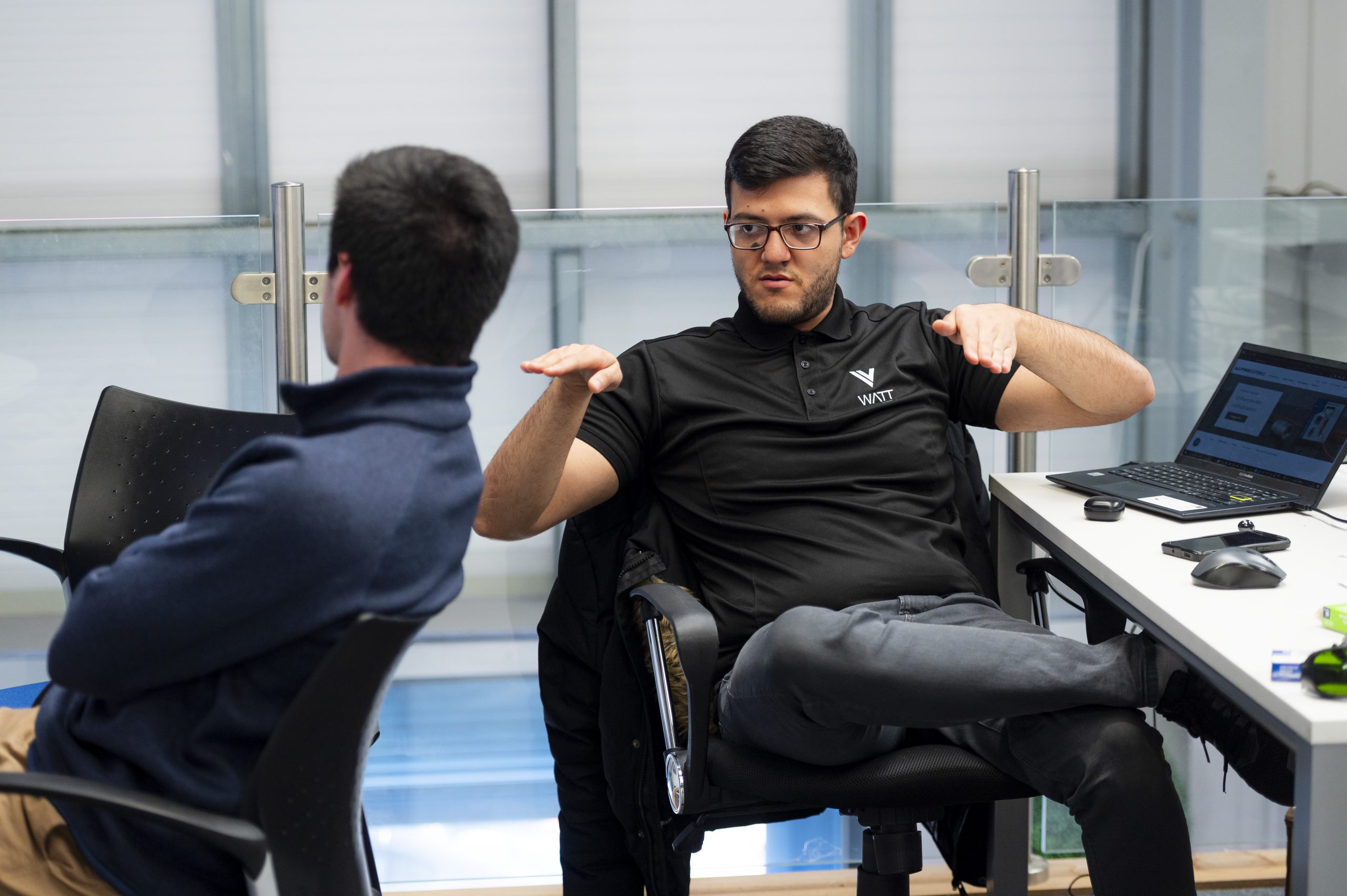 Staff and machinery at Watt Laser in Rutherglen, Glasgow.